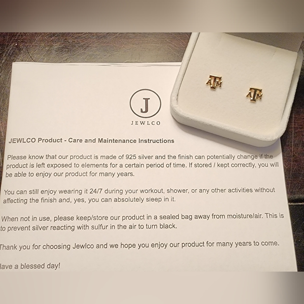 Aggie A&M gold plated, sterling silver earrings.  Brand new with gift box.